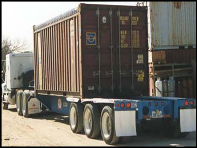 Flatbed truck loading containers of soybeans. (Photo courtesy of SB&B Foods Inc., Casselton, N.D.)